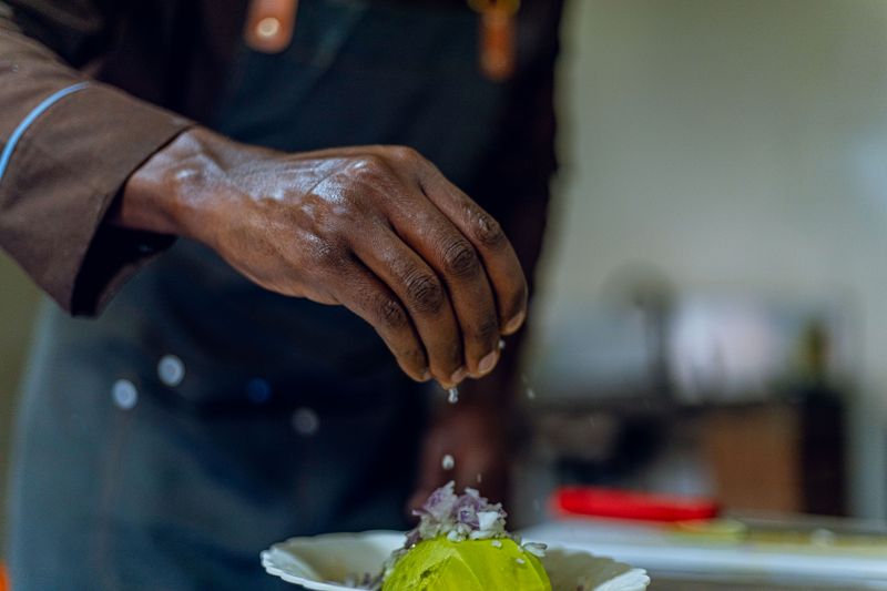 Starbird chicken team preparing fresh ingredients with care
